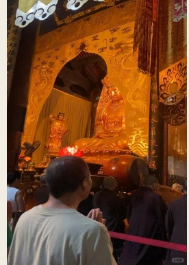 Visitors gathered for an evening temple practice